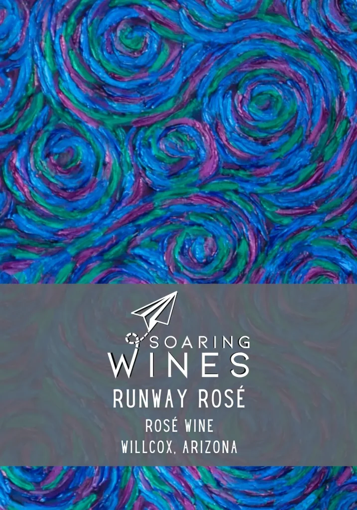 Wine label for Soaring Wines Runway Rosé Wine from Willcox, Arizona, featuring vibrant blue, purple, and green swirling patterns with white typography and paper airplane logo on artistic background